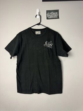 KAWS Black Short Sleeve Pocket Tee with White Chest Graphic